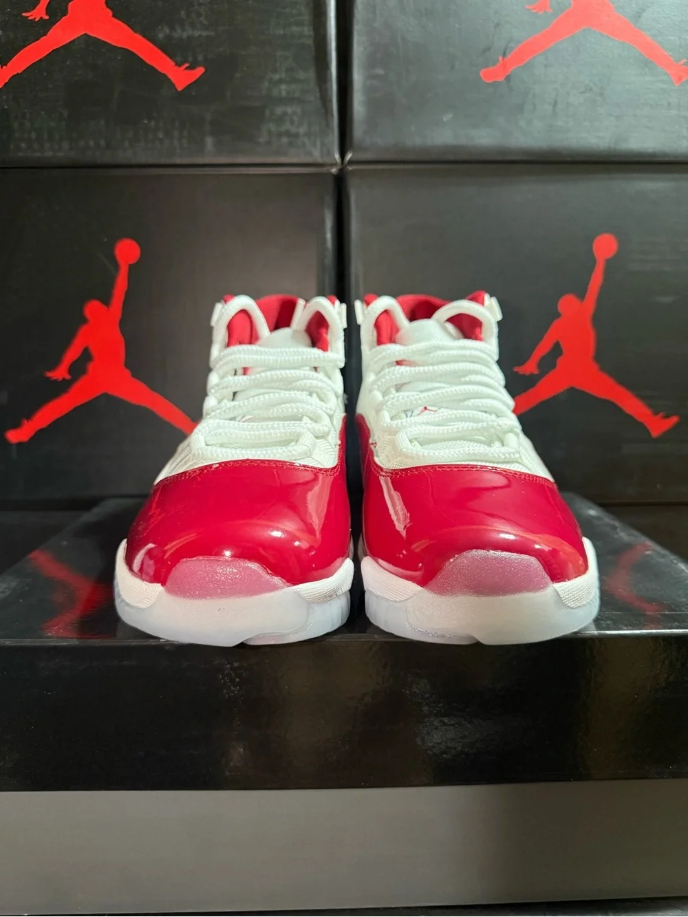 Jordan 11 Retro Cherry Low-Top Sneaker in White & Red